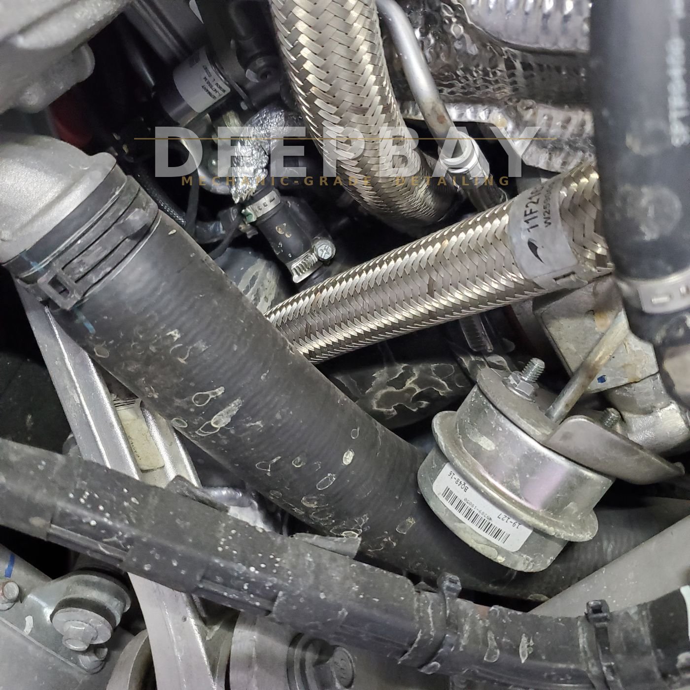 Coolant Return Hose — Before